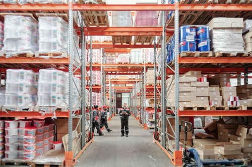 US workers in large warehouse